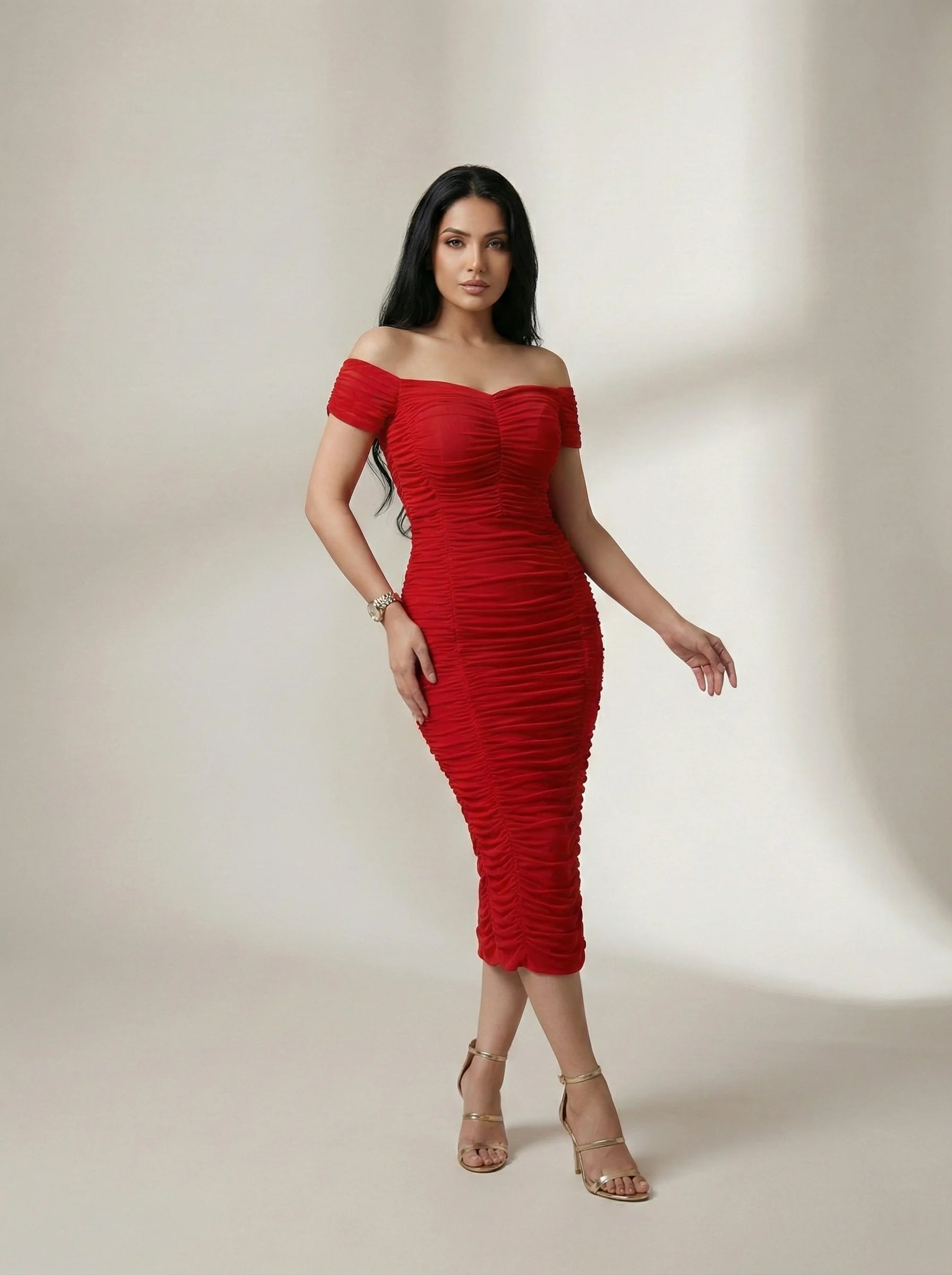 Model wearing SwanClad print A-line dress in red with off-shoulder neckline and ruched bodycon silhouette front view.