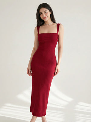 Angled front view of SwanClad Red Solid Sleeveless Midi Bodycon Dress displaying body-hugging fit and minimal design