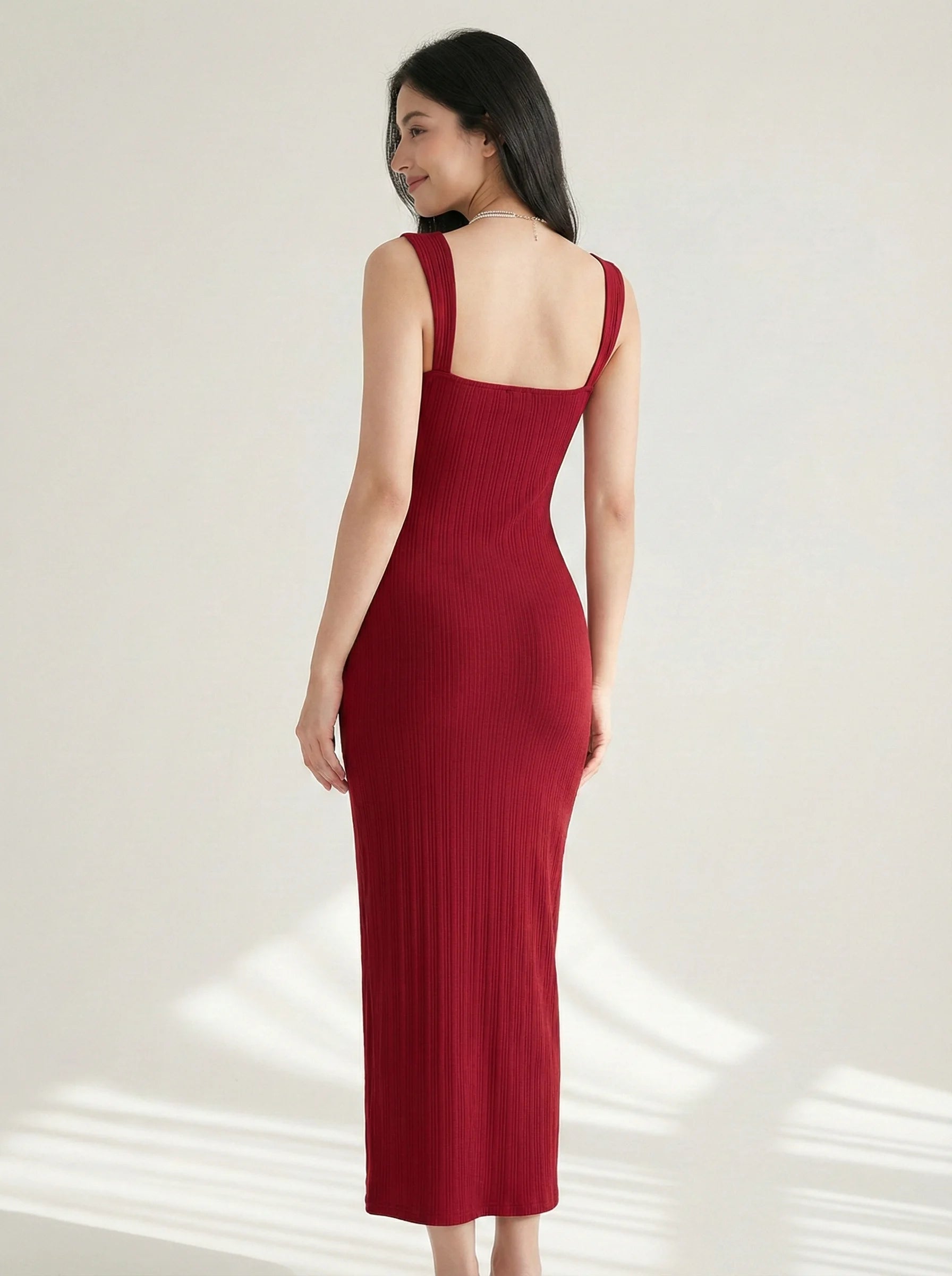 Back view of SwanClad Red Solid Sleeveless Midi Bodycon Dress showing sleeveless straps and streamlined bodycon silhouette